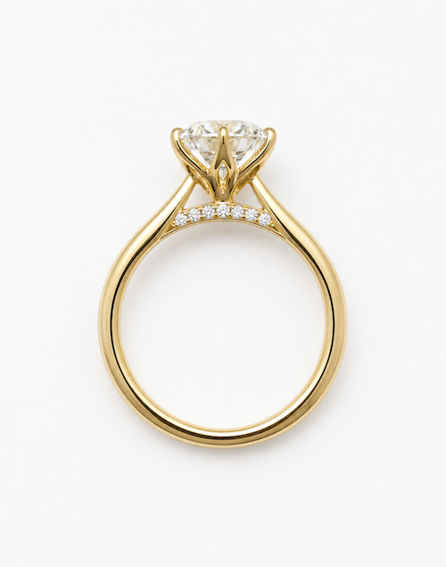 What Is a Cathedral Setting, and Who Is It Actually For? rb tulip yellow gold diamond bridge.webp